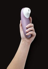 Satisfyer Pro wellness device held in hand, side view